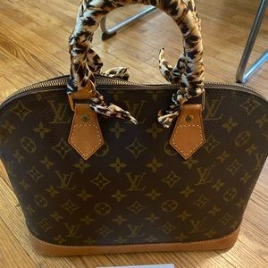 Louis Vuitton Alma PM Handbag